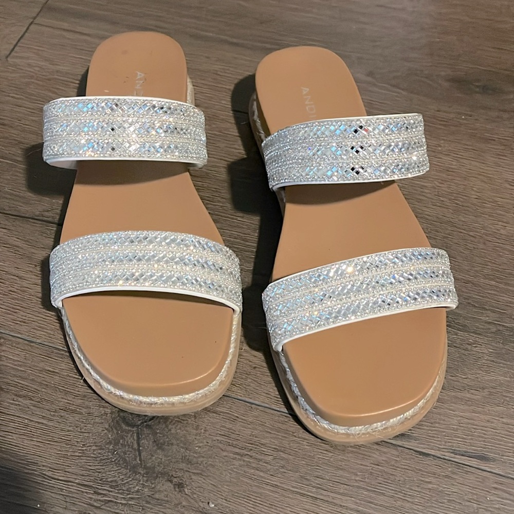 Slide in with silver like gems across the two bands only used once